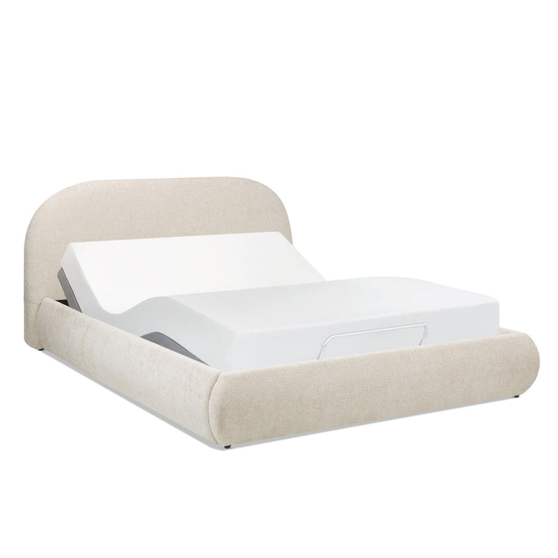 Jennifer Taylor Home Archie Puffy Grounded upholstered platform bed with a plush headboard and modern design, shown in a bedroom setting.