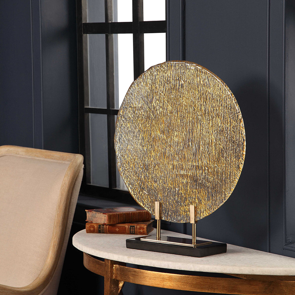 Uttermost Layan Art Glass Charger sculpture in gold with intricate sculpted details, ideal for decorative display.