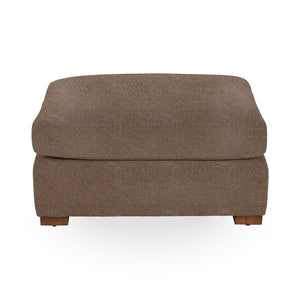 Classic Home Audrey upholstered ottoman with plush fabric and a rectangular shape, perfect as a versatile footrest or accent piece.