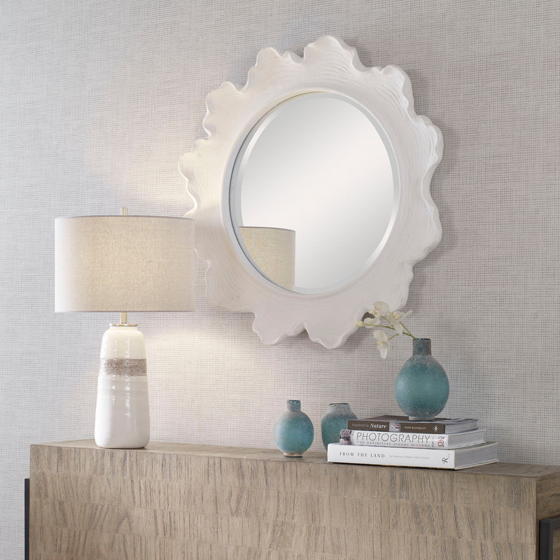 Uttermost white round wall mirror with sea coral design, decorative coastal-inspired wall decor for living room or hallway.