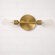 Reverie - Double Lights Bathroom Wall Sconce Over Mirror - Clear / Gold - R&R Furniture Gallery (Fountain Valley, CA)