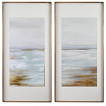 Set of two Uttermost Coastline framed prints with light brown wooden frames, featuring coastal landscape artwork.