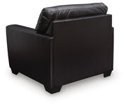 Signature Design by Ashley Glennbre armchair in midnight fabric, featuring plush cushioning and stylish armrests.