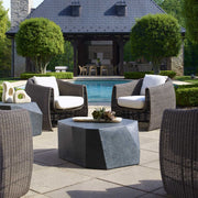 Uttermost Parra outdoor coffee table with a sleek, modern metal frame and a glass top for outdoor patio or garden use.