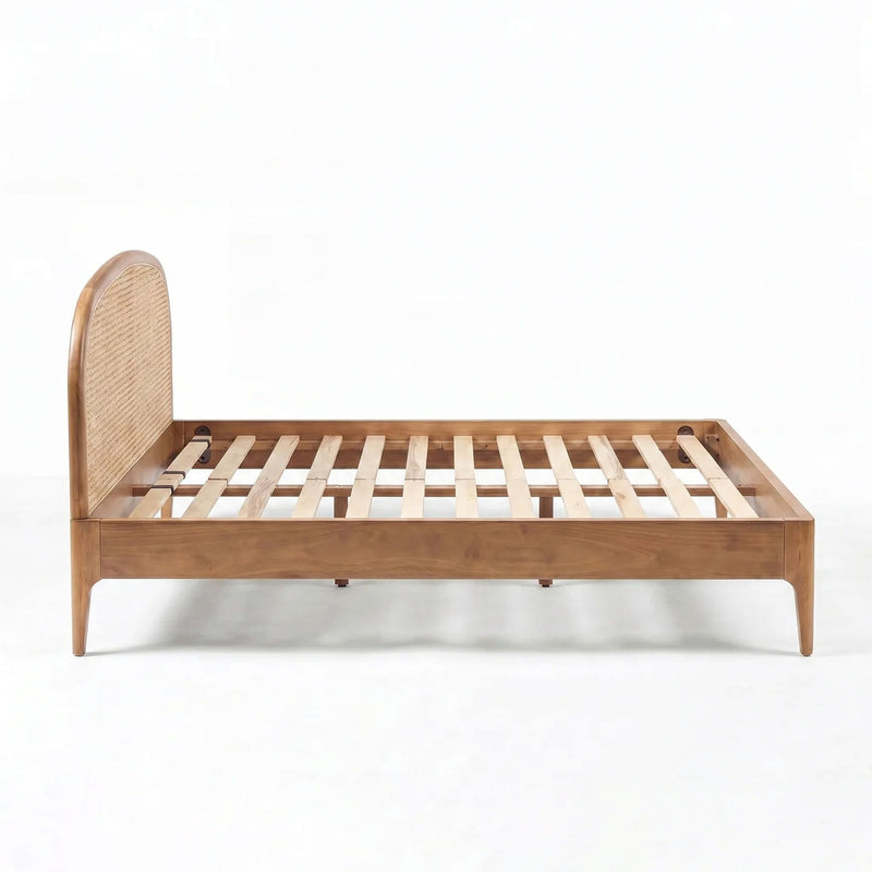 Rattan panel bed by TOV Furniture featuring a natural wood finish and sleek, modern design for stylish bedroom decor.