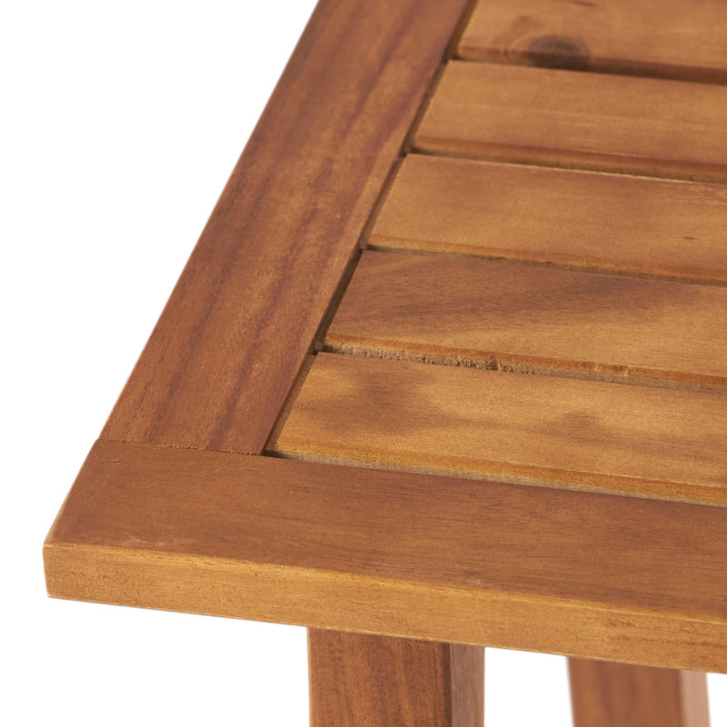 Noble House Kinesis outdoor side table with slatted top and wood frame, ideal for patio or garden settings.