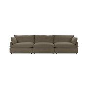 Classic Home Caplan modular sectional sofa with plush cushions and modern design, shown in a neutral fabric.