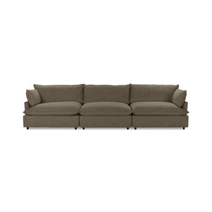 Classic Home Caplan modular sectional sofa with plush cushions and modern design, shown in a neutral fabric.