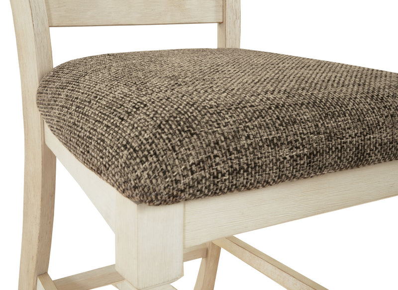 Set of two beige upholstered Bolanburg barstools by Signature Design Ashley with padded seats and wooden legs.