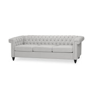 Noble House Chesterfield style 3-seater sofa with deep button tufting, featuring classic design and plush upholstery.