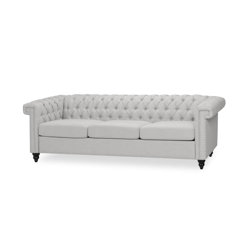 Noble House Chesterfield style 3-seater sofa with deep button tufting, featuring classic design and plush upholstery.