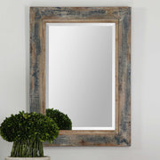 Distressed blue wall mirror from Uttermost's Bozeman collection, featuring a rustic, textured frame perfect for farmhouse decor.
