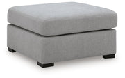 Benchcraft Lakepoint oversized accent ottoman in nickel finish, showcasing its plush upholstery and modern design.