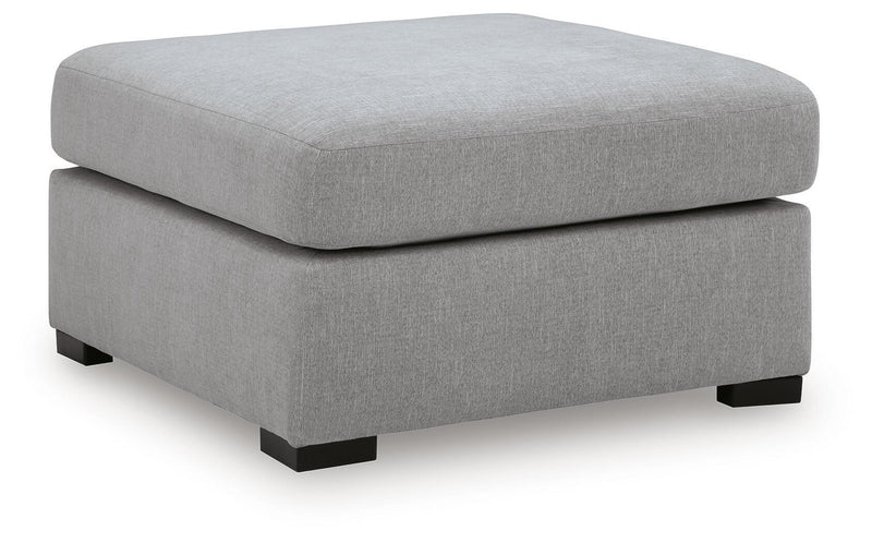 Benchcraft Lakepoint oversized accent ottoman in nickel finish, showcasing its plush upholstery and modern design.