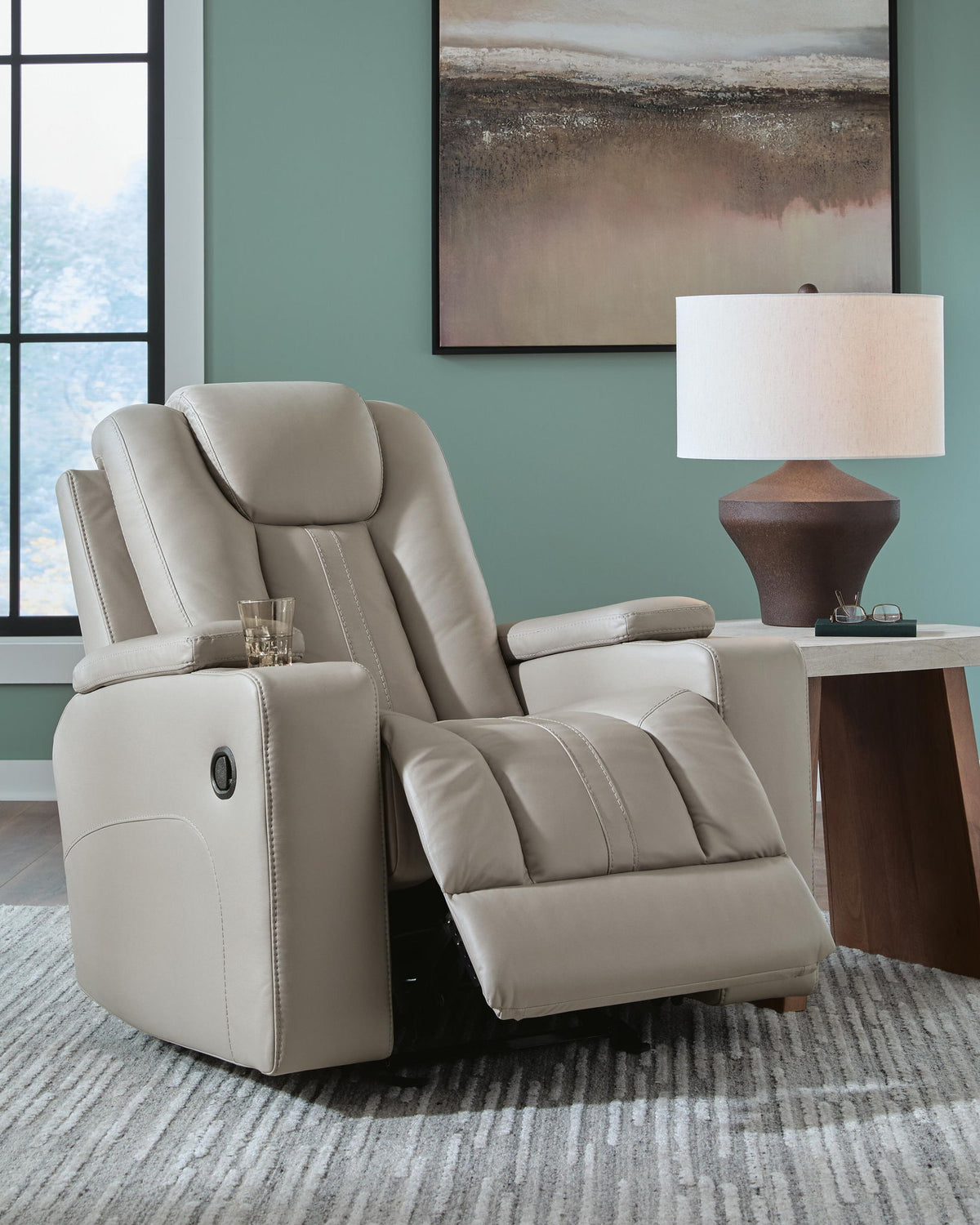 Signature Design by Ashley Elevate Edges Glider Recliner in Coin fabric, featuring plush cushioning and smooth gliding mechanism.