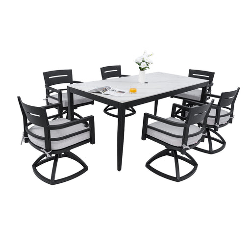 Modern outdoor patio dining set by Life Outside with a table, six chairs, and Sunbrella cushions, perfect for outdoor gatherings.