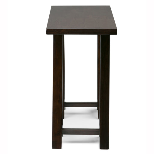 Handcrafted Simpli-Home console sofa table with sawhorse-style legs, featuring a sleek wooden surface for living room decor.