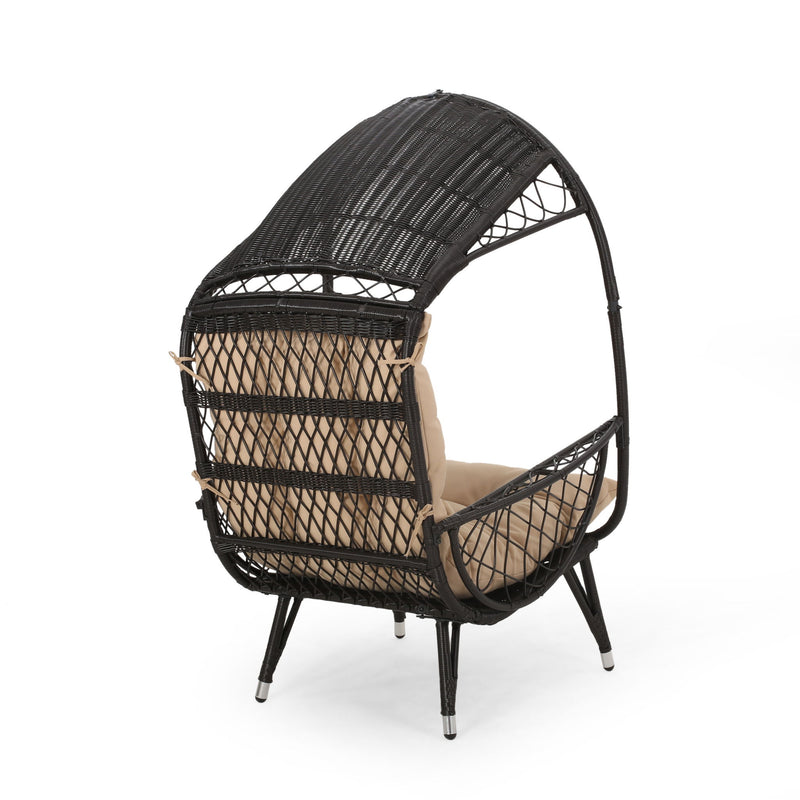 Noble House outdoor wicker standing basket chair with cushion, stylish accent chair for patio or garden seating.