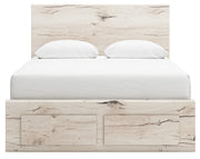 Signature Design by Ashley Lawroy panel bed with built-in storage drawers, showcasing a modern wooden frame and clean design.