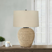 Beige 8th Street transitional table lamp with rattan and resin base, featuring a stylish and modern design.