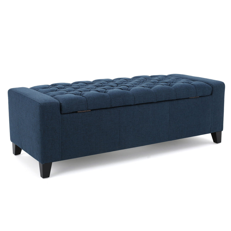 Noble House Guernsey Ottoman Storage with tufted top and beige fabric, serving as a stylish storage and seating solution