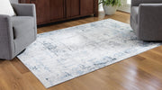 Signature Design by Ashley washable rug with colorful geometric pattern, soft textile, and durable construction.