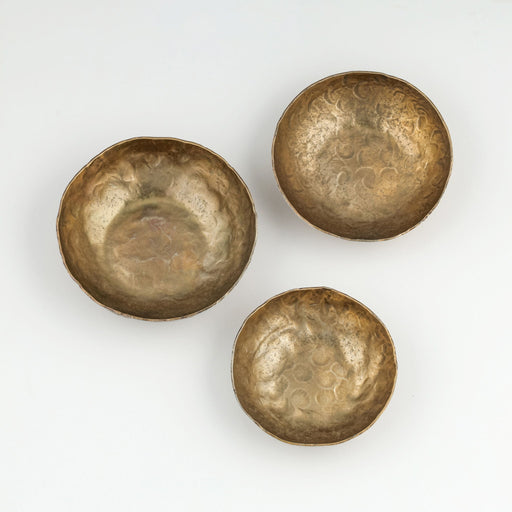 Set of three Shah hammered iron catchall round bowls in antique brass by TOV Furniture, ideal for serving or decorative use.