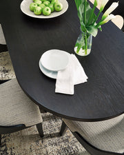 Rowanbeck - Oval Dining Room Table - Black - R&R Furniture Gallery (Fountain Valley, CA)