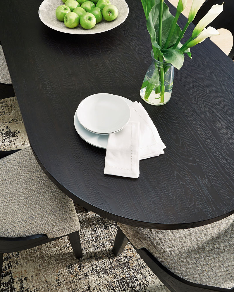 Rowanbeck - Oval Dining Room Table - Black - R&R Furniture Gallery (Fountain Valley, CA)