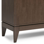Simpli-Home Harper sideboard buffet with wooden finish, featuring multiple storage cabinets and drawers for dining room organization.