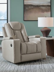 Signature Design by Ashley Elevate Edges Glider Recliner in Coin fabric, showing plush cushioning and smooth gliding mechanism.
