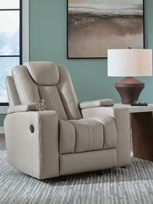 Signature Design by Ashley Elevate Edges Glider Recliner in Coin fabric, showing plush cushioning and smooth gliding mechanism.