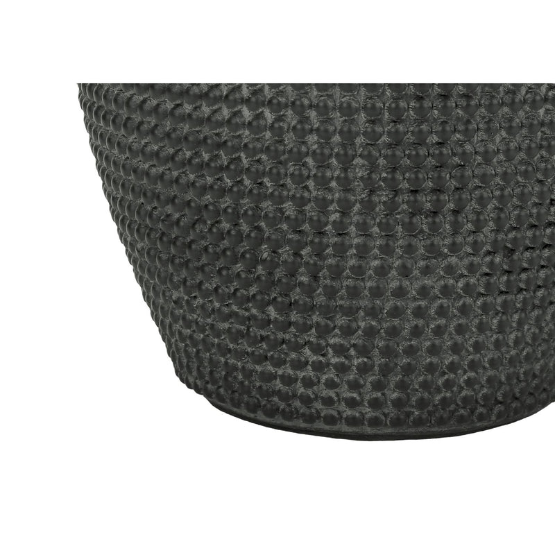 Contemporary black resin table lamp by 8th Street, modern design with a sleek, minimalist appearance for home decor.