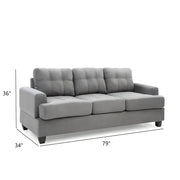 Glory Furniture Sandridge stationary sofa with plush beige upholstery and wide armrests, shown in a modern living room setting.