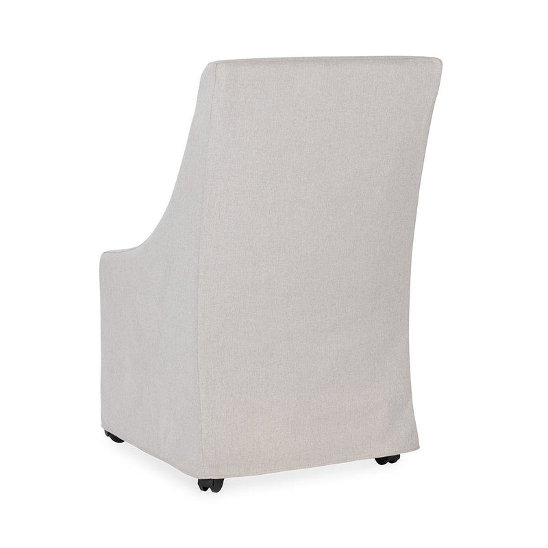 Warwick - Upholstered Rolling Dining Chair - R&R Furniture Gallery (Fountain Valley, CA)