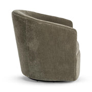 Classic Home Valencia swivel accent chair with patterned fabric and wooden base, positioned in a cozy living room setting.