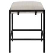 White Uttermost Paradox counter stool with sleek metal frame and cushioned seat, designed for counter height seating.