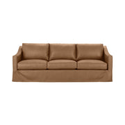 Classic Home Kipton upholstered stationary sofa with plush fabric and cushioned armrests, showcased in a cozy living room setting.