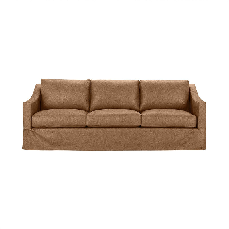 Classic Home Kipton upholstered stationary sofa with plush fabric and cushioned armrests, showcased in a cozy living room setting.