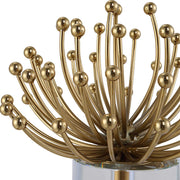 Set of two modern gold sculptures by Uttermost featuring abstract, sleek design for contemporary decor.