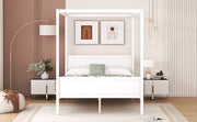 DreamHaus canopy platform bed with headboard, footboard, and slat support legs, showcasing a sturdy wooden frame and elegant design.