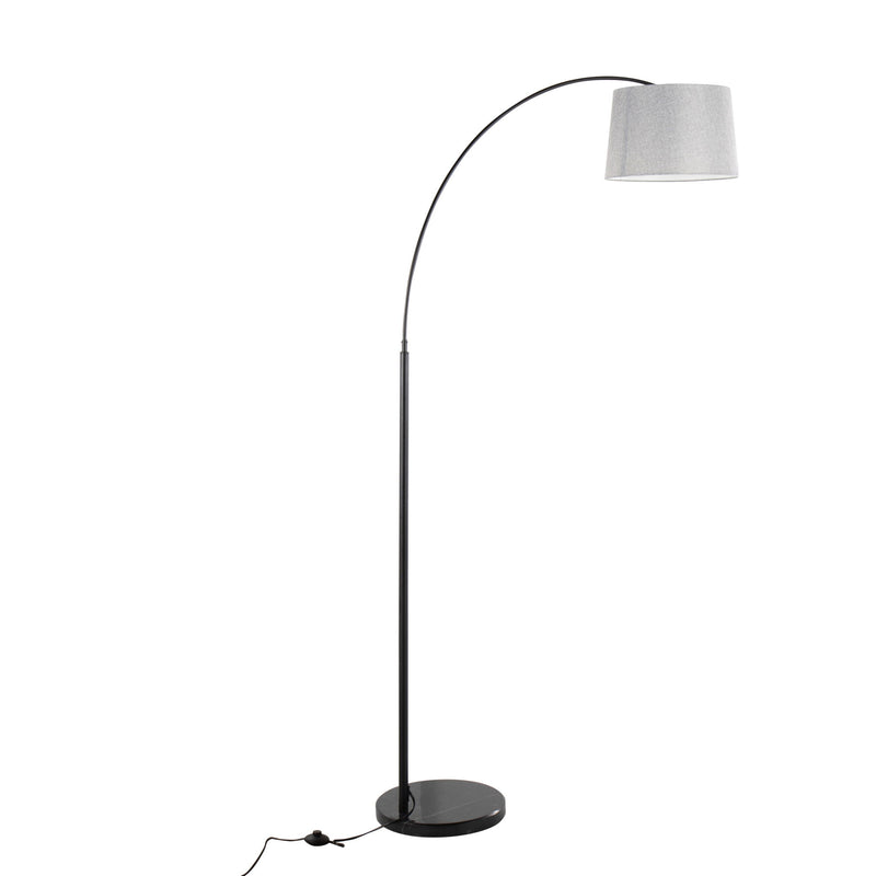 Lumi Source March contemporary floor lamp with sleek design and adjustable arm, standing on a circular base in a modern living room.