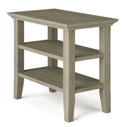 Handcrafted Acadian narrow side table by Simpli-Home with a sleek wooden finish and minimalist design.