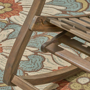 Gray outdoor reclining rocking chair by Noble House, featuring a comfortable design and sturdy frame for outdoor relaxation.