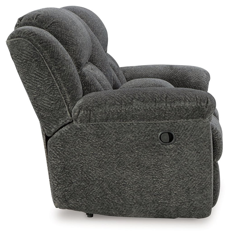 Signature Design by Ashley® Frohn reclining living room set with plush sofas and loveseats, featuring soft fabric and reclining features.