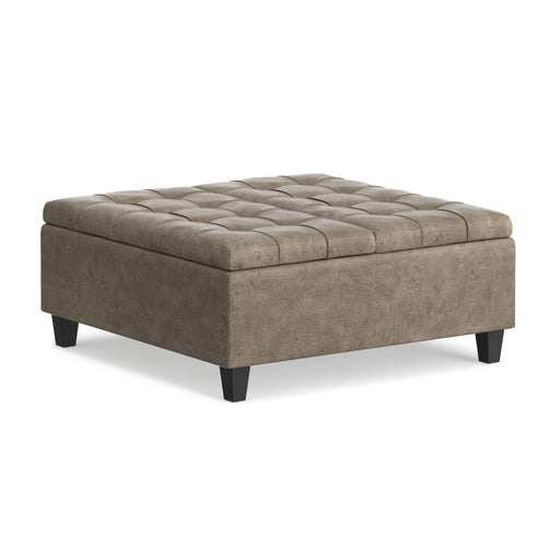 Brown Harrison square coffee table ottoman by Simpli-Home with a cushioned top and wooden legs, versatile for living room use.