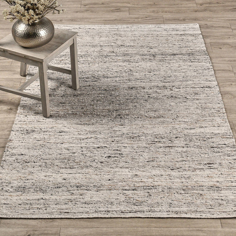 Classic Home Havasu area rug with intricate geometric patterns in neutral tones, suitable for living rooms and bedrooms.