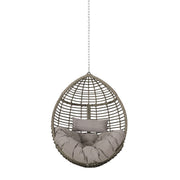 Noble House Morris Teardrop hanging chair with chain and water-resistant cushions, shown in a cozy outdoor setting.