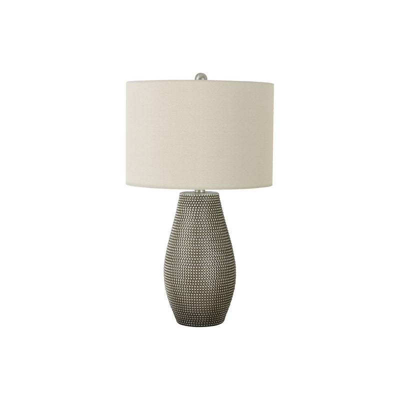 Gray resin table lamp by 8th Street featuring a sleek contemporary design and a modern aesthetic.