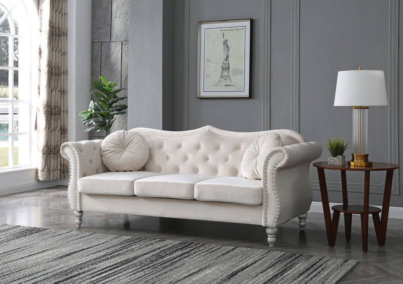 Glory Furniture Hollywood stationary sofa with plush cushions and sleek design, shown in a modern living room setting.